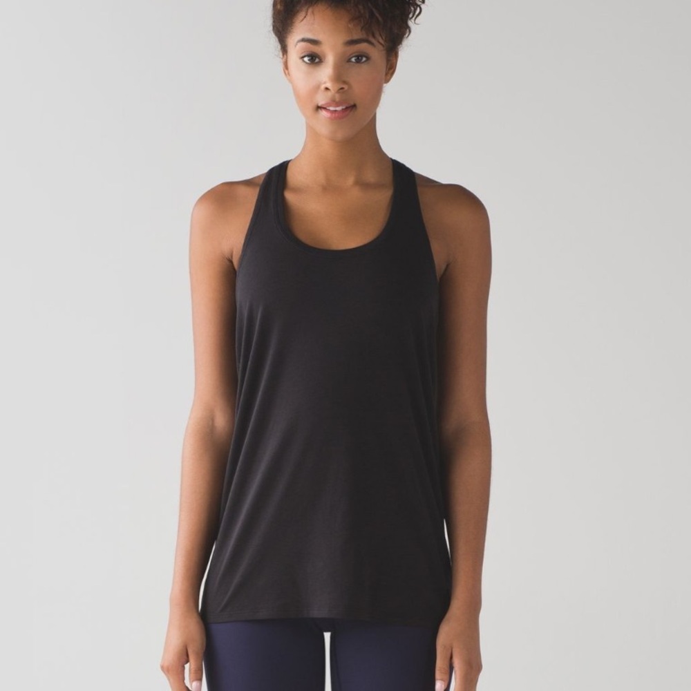 ⢠Lululemon ⢠Womenās Racerback Athletic Tank Top
Black Pima Cotton 4